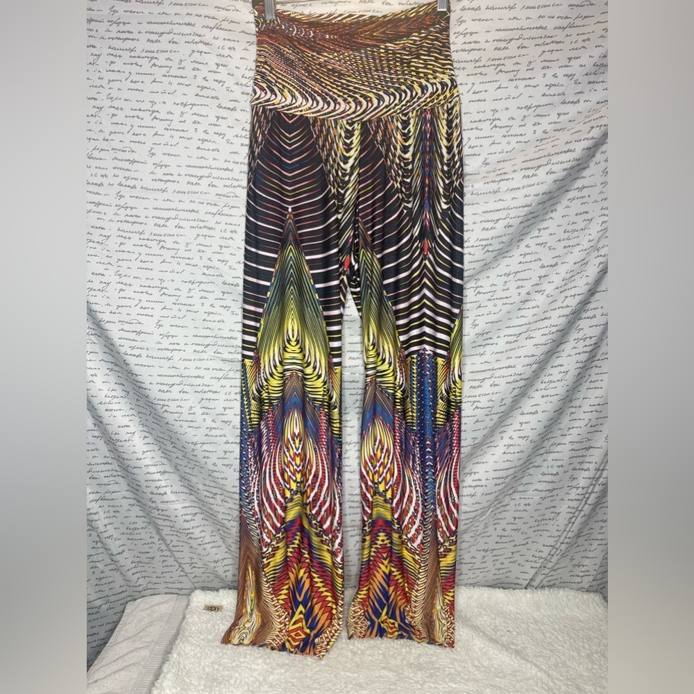 Women’s size L multi-color pants! They’re wild! Fit like size 8 - 10 - 12 best.